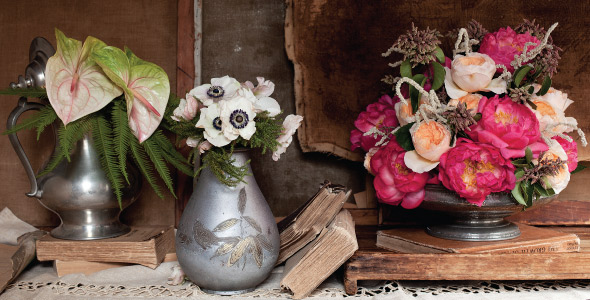 Floral arrangements in metal containers