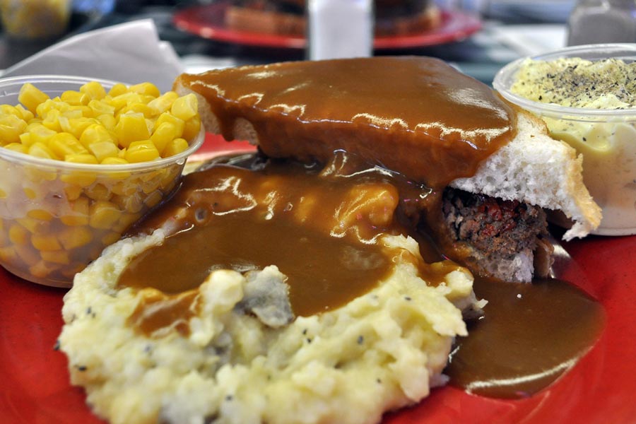 A roast beef sandwich, corn and mashed potatoes with gravy from Wally's Roast Beef in Bloomington, Minnesota.