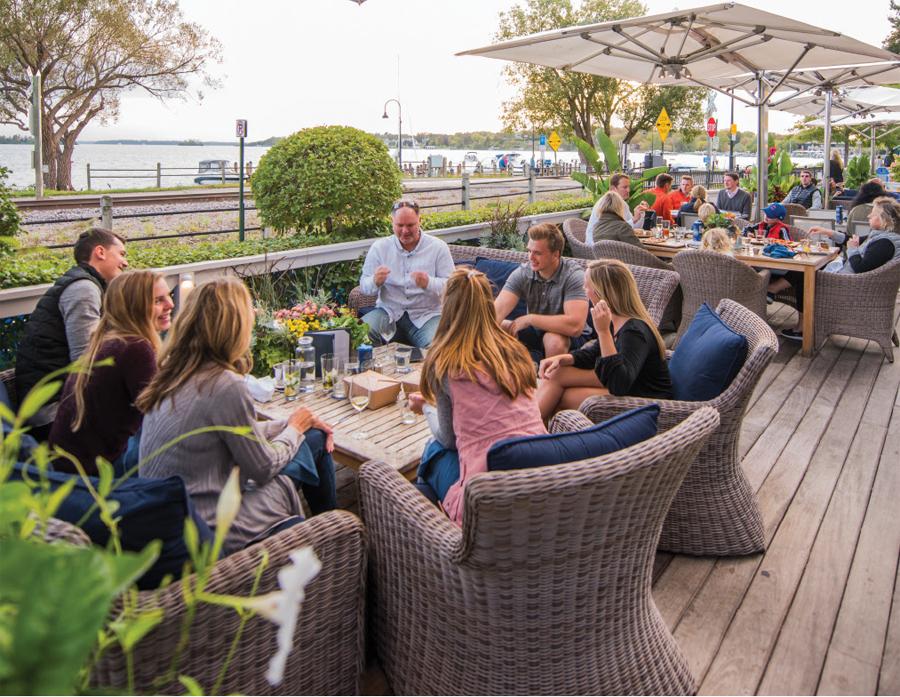 People dining on the patio at CoV Wayzata.