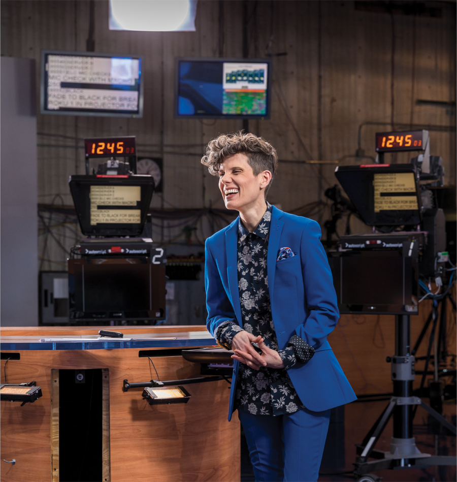 Kare 11 anchor Jana Shortal laughing at her desk in the studio.