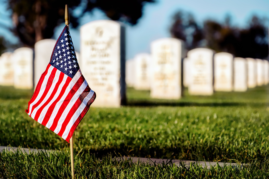 an American flag in cemetery