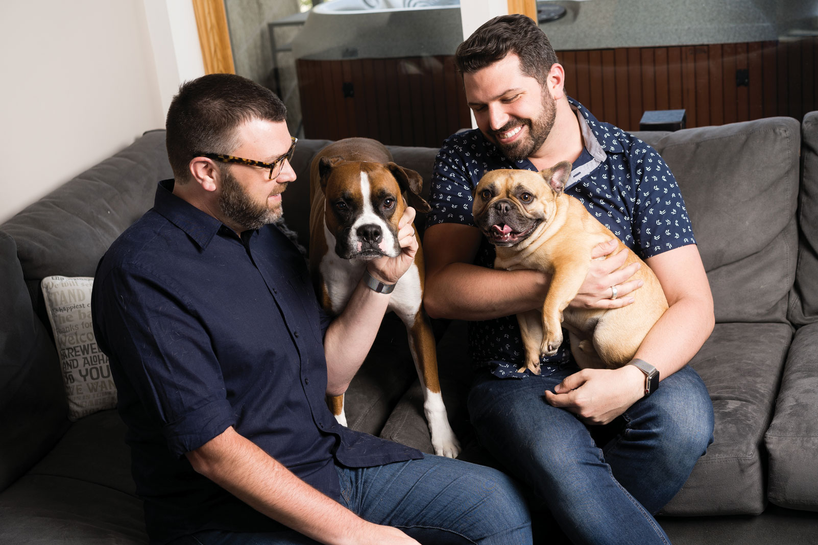 Jason (left) with husband Collin and their dogs, Dexter (left) and Mr. Big