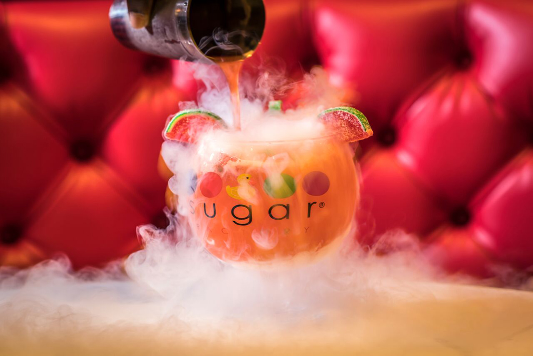 A 64-ounce smoking cocktail with gummy candy on top.