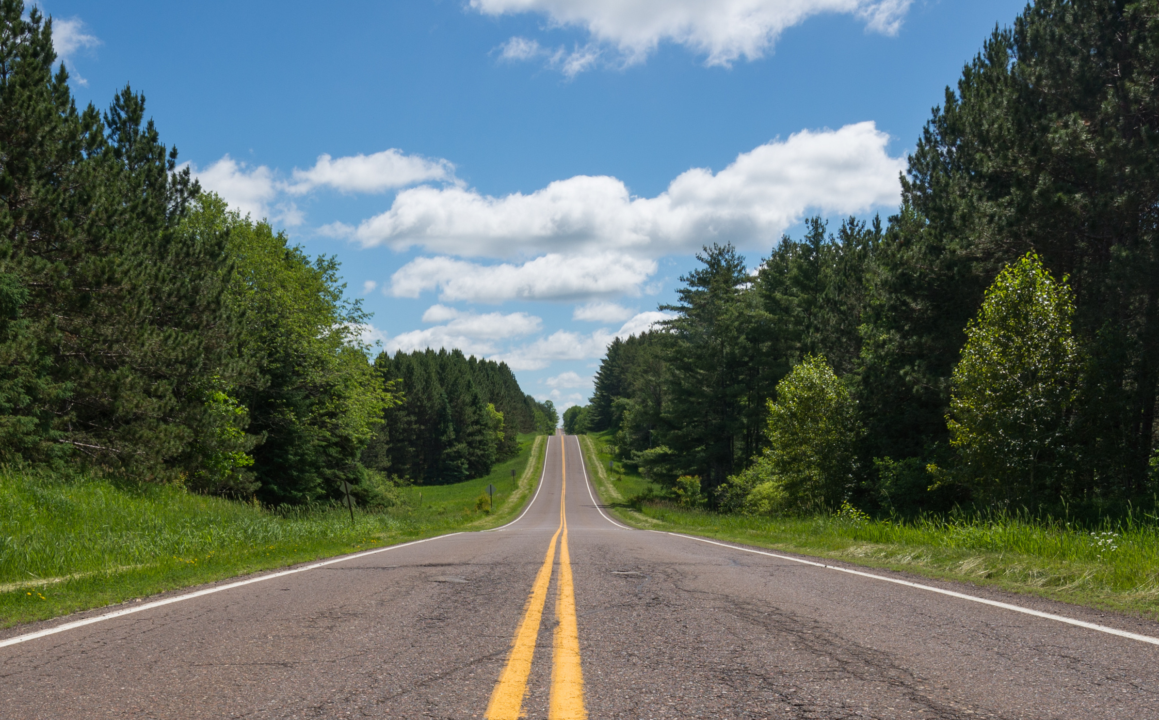 driving through Minnesota on an empty road