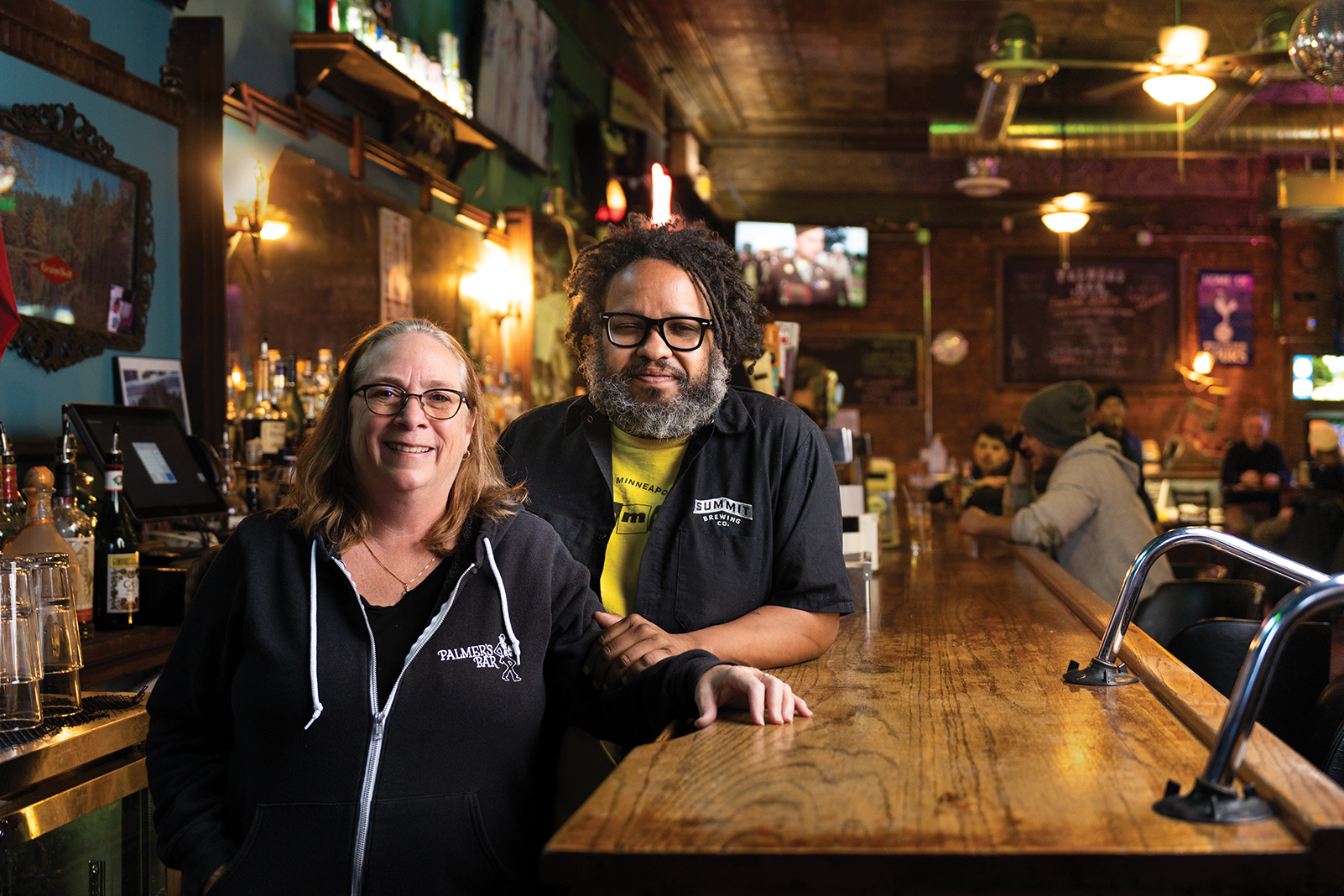 Lisa Hammer, left, sold Palmer’s Bar to Tony Zaccardi, right, in 2018