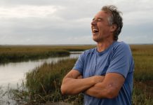 Dan Buettner exploring the landscape near St. Helena Island in South Carolina