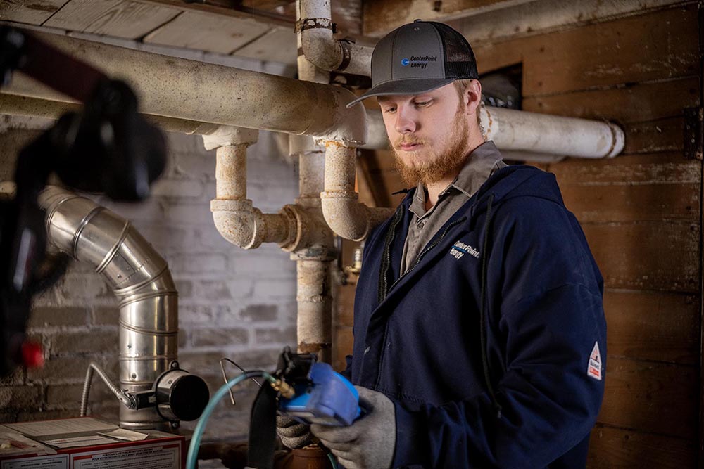 employee checking water heater