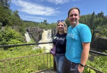 Meet the Writer Who Visited All 856 Towns in Minnesota Seth and Eliese Varner at High Falls in Grand Portage, Minnesota