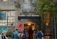 Visitors check out the Casket Arts Building, one of many Art-A-Whirl venues